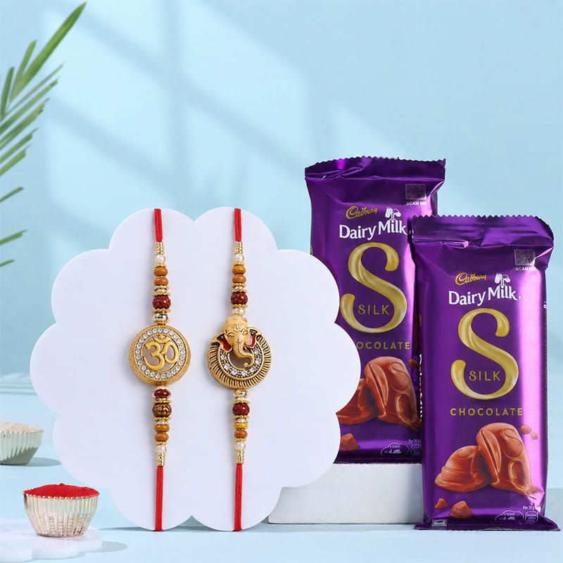 Divine Om N Ganesha Rakhis With Cadbury Silk Bars
