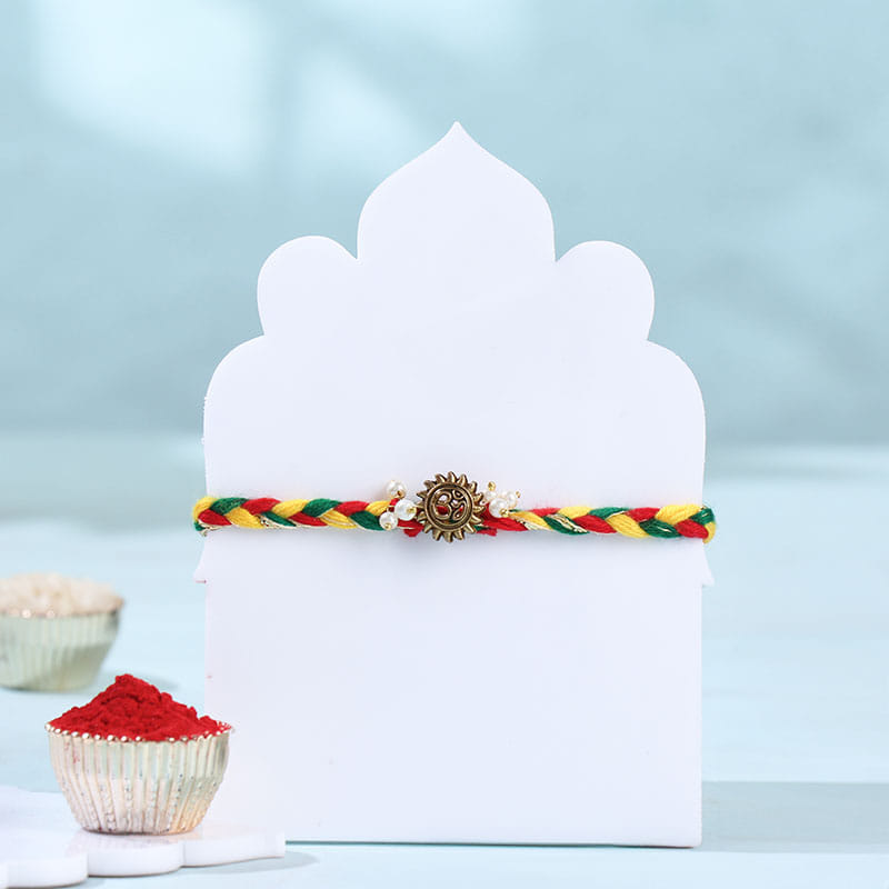Divine Om Rakhi With Almonds N Cashews
