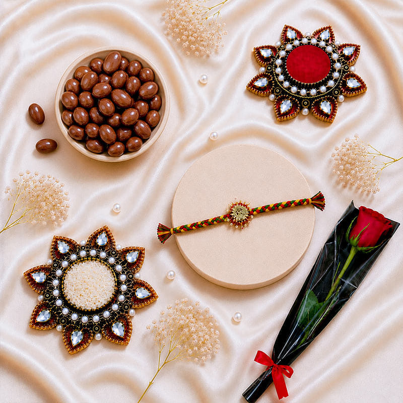 Divine Om Rakhi With Choco Almonds N Rose
