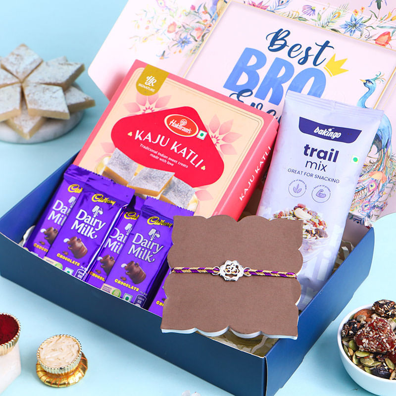 Divine Om Silver Rakhi N Choco Sweets Nuts Hamper