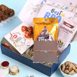 Divine Om Silver Rakhi N Sweet Savour Treat Hamper