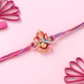 Divine Pink Ganesha Rakhi