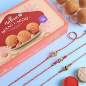 Divine Rakhi Set Of Three With Besan Ladoos