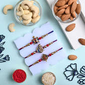 Divine Rakhi Trio With Nutty Treats