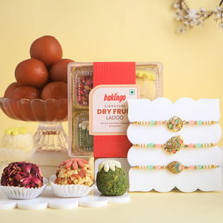 Divine Rakhi Trio With Traditional Sweets