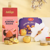 Divine Trishul Rakhi With Ladoos N Chocolates
