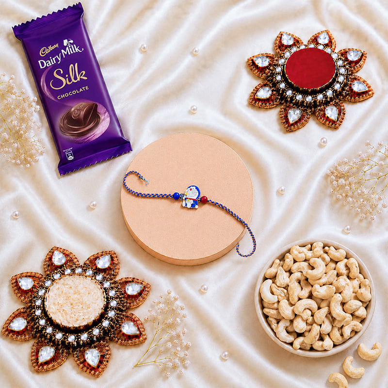 Doraemon Cartoon Rakhi With Chocolate N Cashews