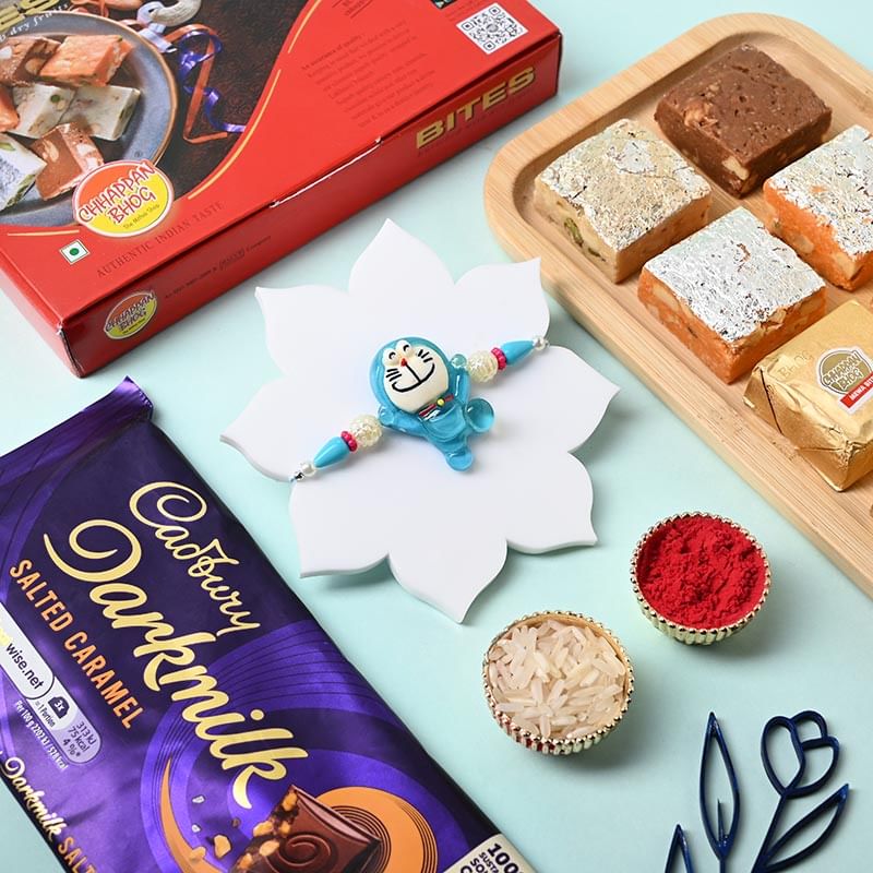 Send Kids Rakhi With Mewa Bites N Cadbury Chocolate