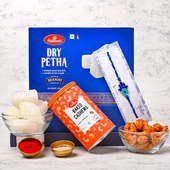 Fancy Rakhiwith Sweets & Dry Fruits for Brother Online Delivery - Delicious Dry Petha With Healthy Baked Cashews And Blue Good Luck Rakhi