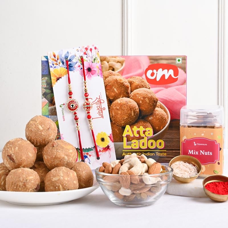 Dual Meenakari Rakhi With Atta Ladoo N Mix Dry Fruits: Rakhi set of 2 with sweets