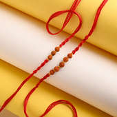 Order Rudraksh Rakhi For Brother Online - Dual Rudraksha Handwoven Red Thread Rakhis