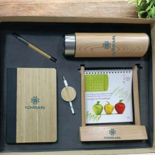 A Box with a notebook, pen, and coffee cup placed on top for a cozy and productive workspace