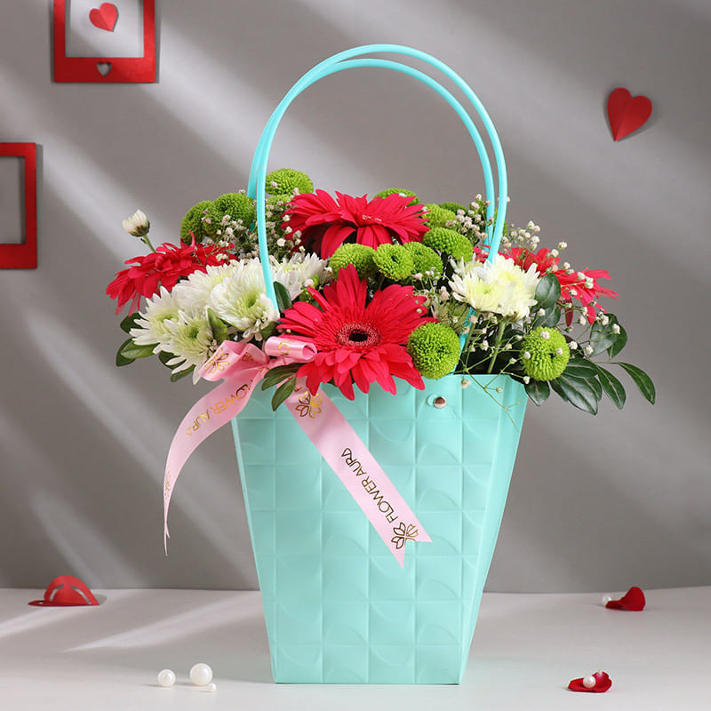 Elegant Blossoms In Teal Basket