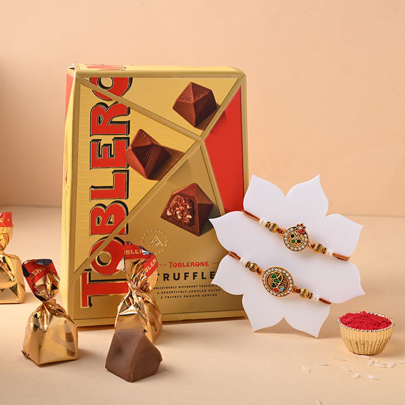 Order Elegant Designer Rakhi Set With Toblerone Chocolate Online in UK