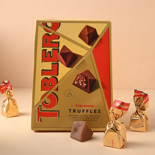 Order Elegant Designer Rakhi Set With Toblerone Chocolate Online in UK