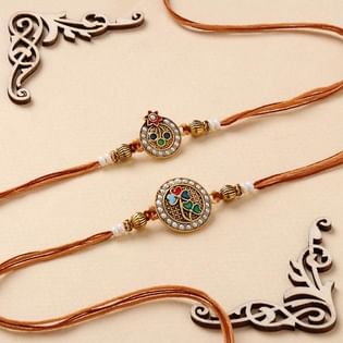 Order Elegant Designer Rakhi Set With Toblerone Chocolate Online in UK