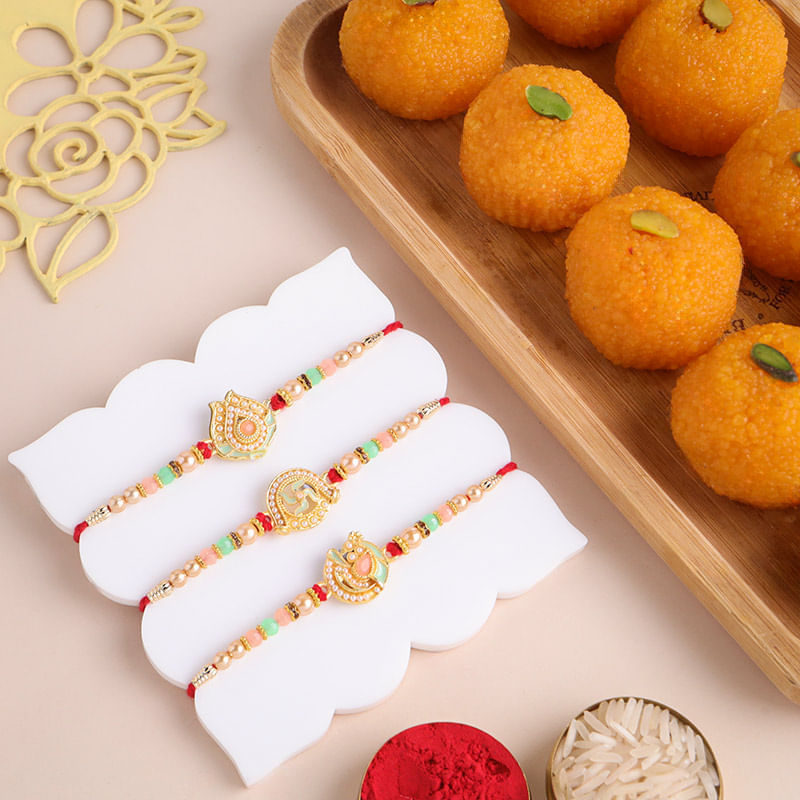 Elegant Designer Rakhi Trio With Motichoor Ladoos