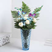 Elegant Floral Arrangement In Glass Vase