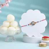 Elegant Floral Rakhi With Rasgullas