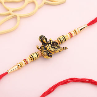 Elegant Ganesha Metal Rakhi