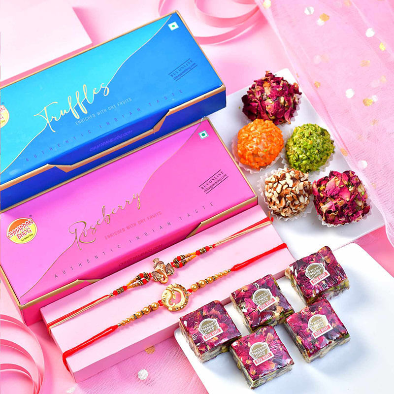 Elegant Gold Rakhi Duo N Gourmet Sweets Hamper