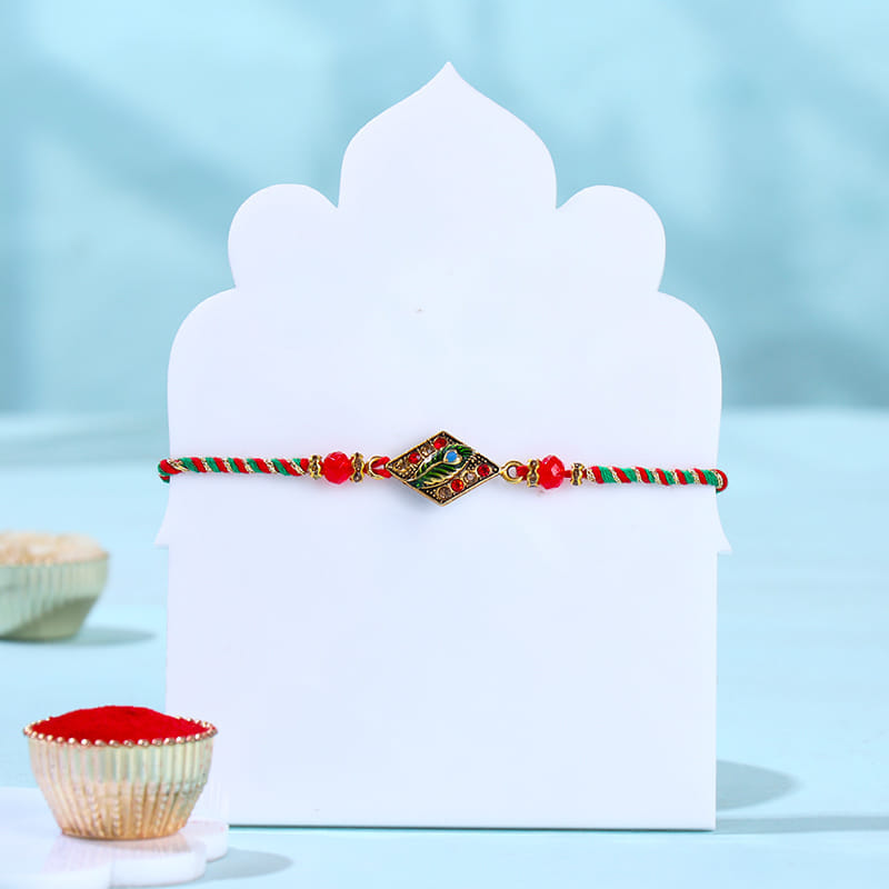 Elegant Mor Pankh Rakhi With Festive Treats