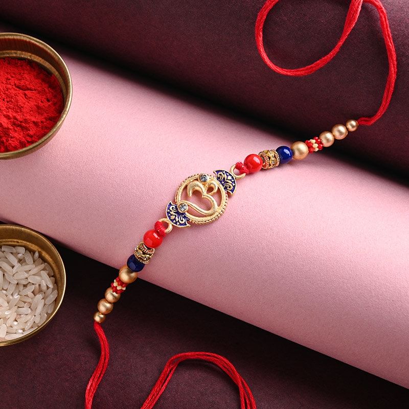 Send Divine rakhi For Brother Online - Embellished Mighty Om Rakhi