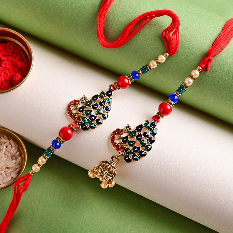 Send Lumba Rakhi For Bhaiya bhabhi Online - Embellished Mor Morni Rakhi