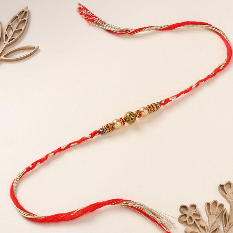 Embellished Om Bead Rakhi