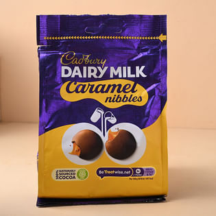 Embellished Rakhi With Cadbury Dark Milk Caramel Bar