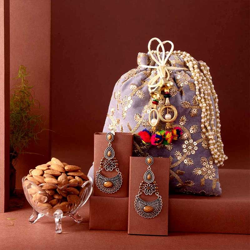 Embroidered Potli n Earrings With Almonds For Poyi Baya