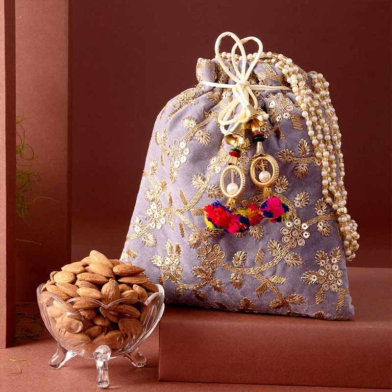 Embroidered Potli With Almonds For Poyi Baya