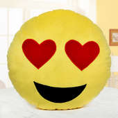 A smiling face with heart eyes pillow