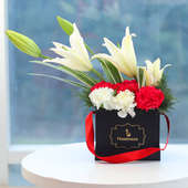Emotions Unfold - Bouquet of 2 Oriental Lilies and 2 White Carnations with 2 Red Carnations