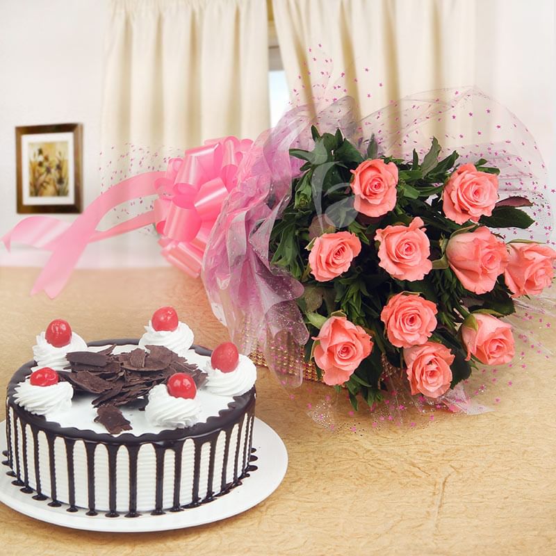 Enchanting Beauty Combo of 10 pink roses with half kg black forest cake