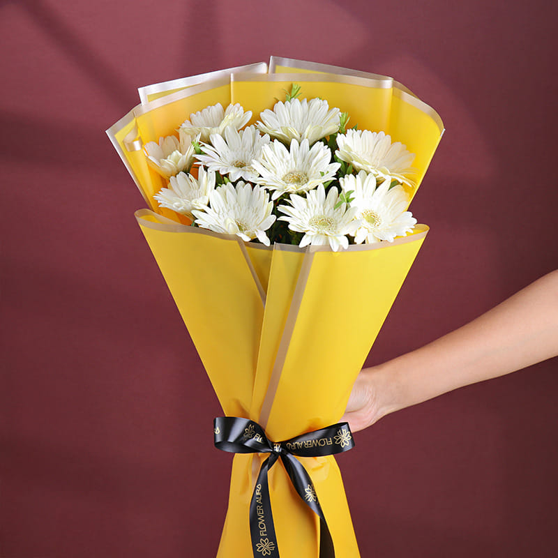 10 White Gerberas In Yellow Premium Paper