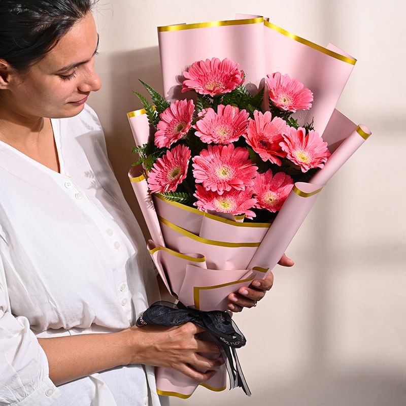 10 Pink Gerberas In Pink Premium Paper: Teachers Day Flowers