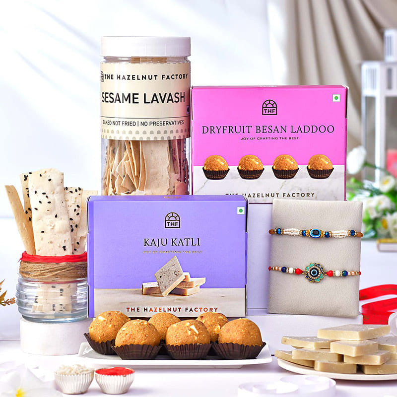 Evil Eye Beaded Rakhi Duo With Festive Munchies