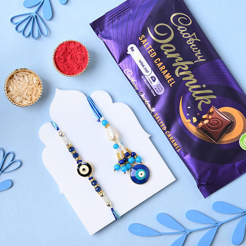 Buy Evil Eye Couple Rakhi With Cadbury Dark Milk Caramel Bar