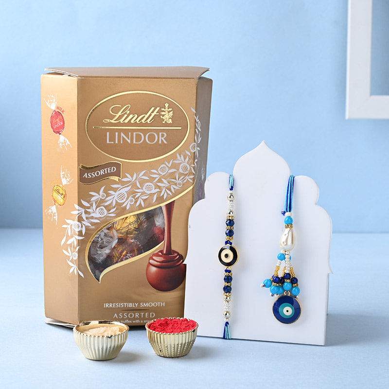 Send Evil Eye Couple Rakhi With Truffle Chocolate to UK