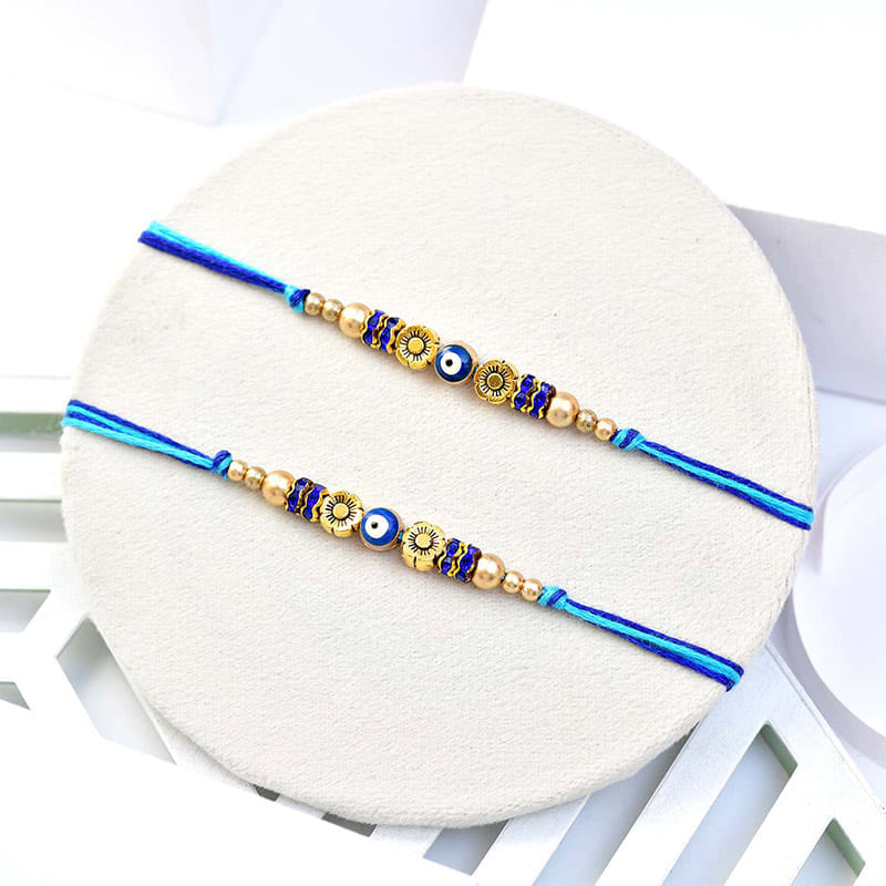 Evil Eye Rakhi Duo With Mewa Bites N Choco Bites