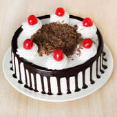 Front view of half kg Blackforest cake - A gift of Expressions Of Endearment combo