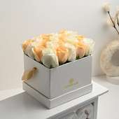 Arrangement of 20 Peach and White Roses in White Floweraura Box
