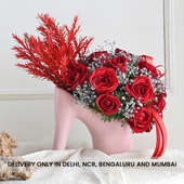 Exquisite Blooms In Quirky Sandal Vase
