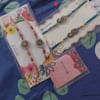 Embellished Peacock Charm Rakhis