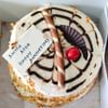 Butterscotch Cake Along With Gerberas Bunch