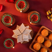 Festive Sweets With Terracotta Diyas