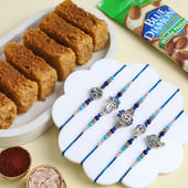 Five Blue N Silver Rakhis With Sweets N Almonds