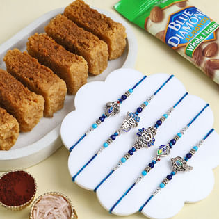 Five Blue N Silver Rakhis With Sweets N Almonds
