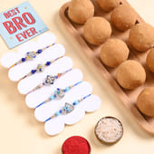 Five Blue N Silver Floral Rakhis With Besan Ladoos